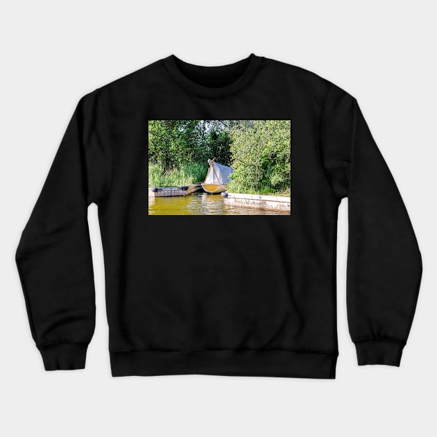 Wooden boat moored in the Norfolk Broads Crewneck Sweatshirt by yackers1